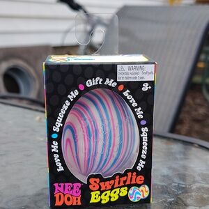 NEEDOH Swirlie Egg: Pink & Blue Swirl Opened And Squished Once